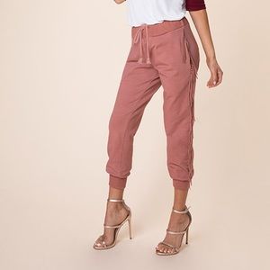 Kittenish Jessie James Decker fringe joggers